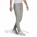 Dlhé športové nohavice Adidas Essentials Fleece Logo Dama Siva