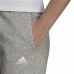 Pitkät urheiluhousut Adidas Essentials Fleece Logo Nainen Harmaa