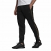 Pantalone Lungo Sportivo Adidas Essentials Camo Print Nero Uomo