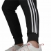Långa träningsbyxor Adidas Essentials French Terry 3 Stripes Kvinna Svart