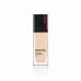 Flytande makeupbas Shiseido Skin Radiant Lifting Nº 130 Opal Spf 30 30 ml
